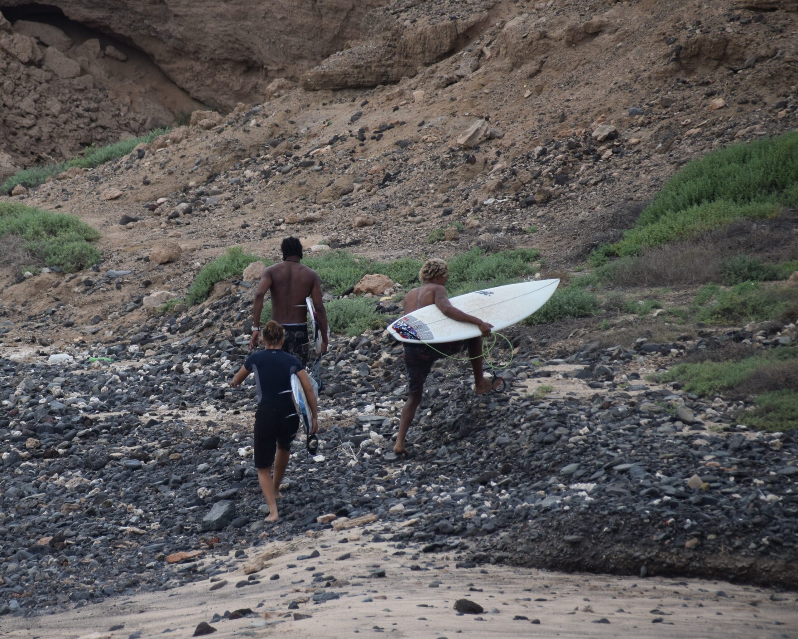 Surf guide leading surfers to a remote surf spot in Boa Vista, Cape Verde