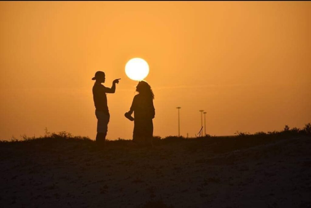Surf guide showing clients the beauty of Boa Vista during sunset in Cape Verde