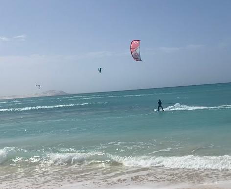 Kitesurfers riding at Estoril Beach in Boa Vista, Cape Verde
